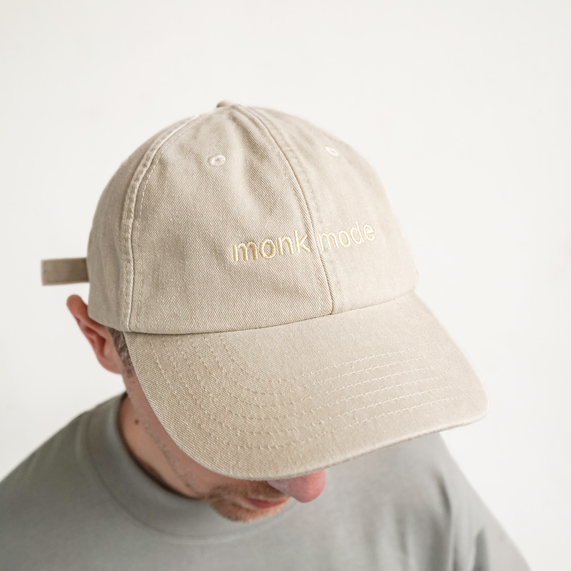 monk mode cap on a man's head